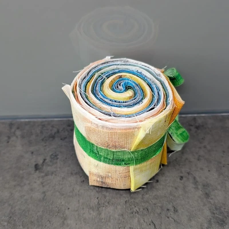 Proužky látek na patchwork Jelly Roll Interwoven