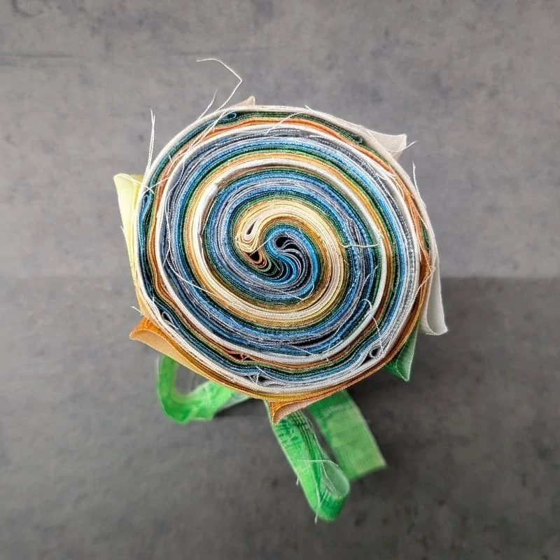 Proužky látek na patchwork Jelly Roll Interwoven