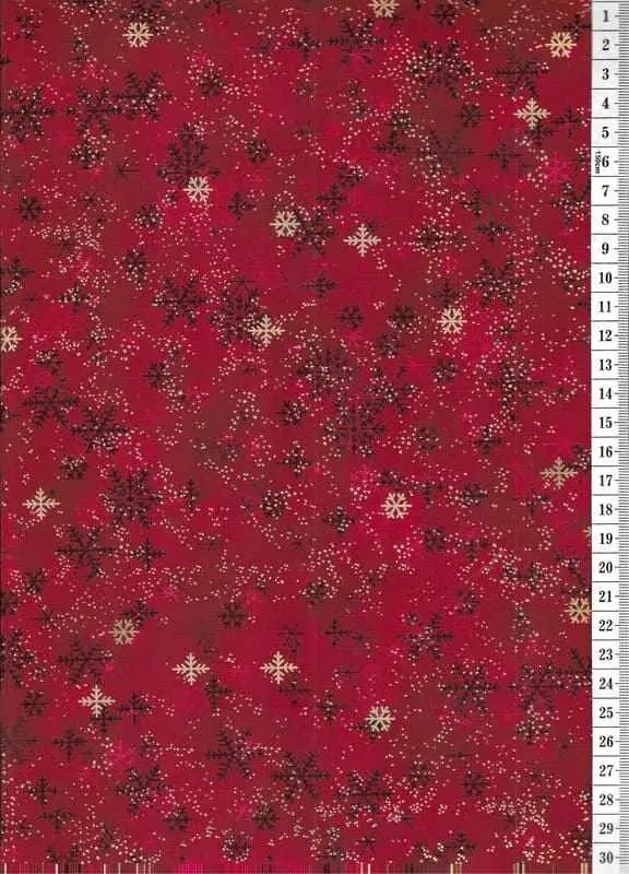 Látka na patchwork černé a zlaté sněhové vločky na červené