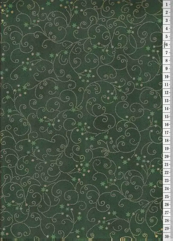 Látka na patchwork zlaté arabesky a hvězdičky na zelené