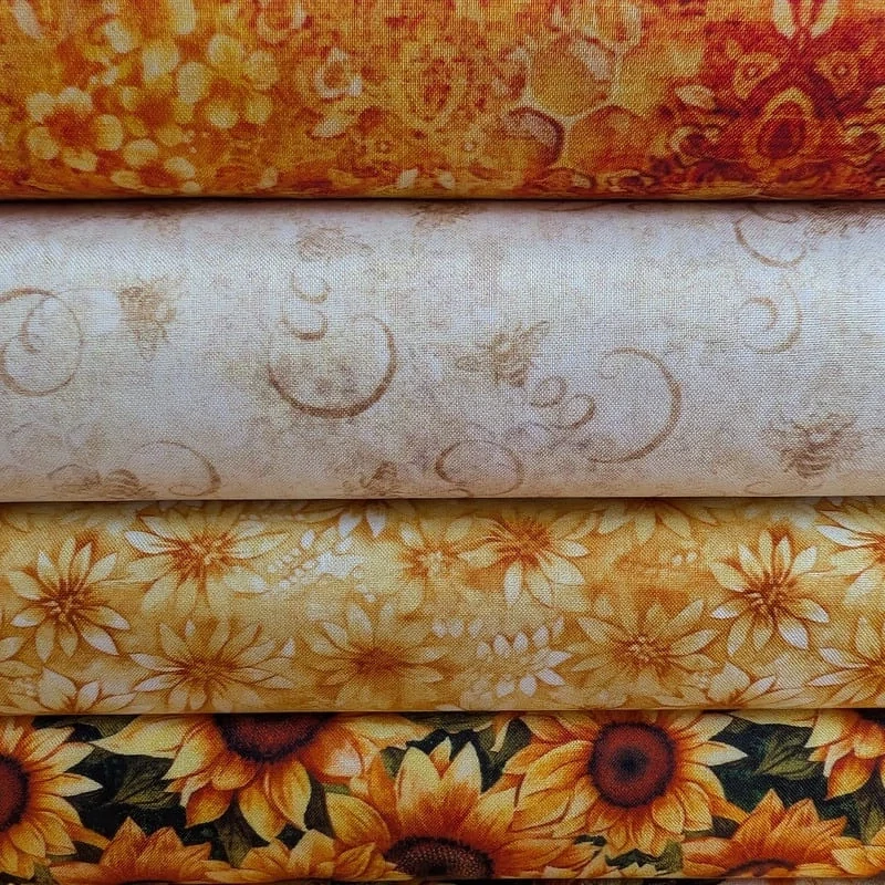 Látka na patchwork malé slunečnice na žluté