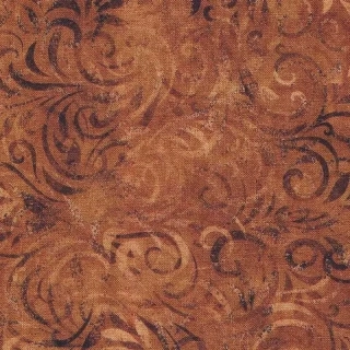 Hnědé lístečky a spirály na karamelové