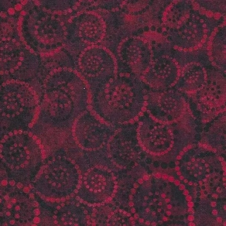 Červené a černé spirály na bordó