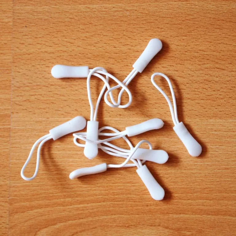 Poutko na zip bílé